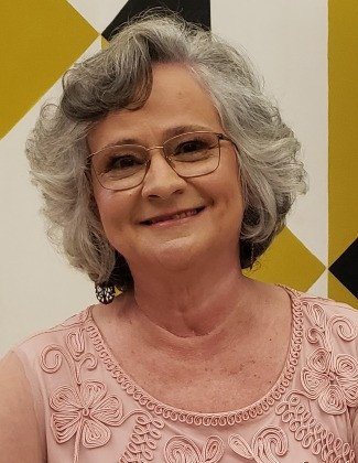 Dra. Cristina Reis, farmacêutica-bioquímica graduada pela Universidade Estadual de Londrina – UEL